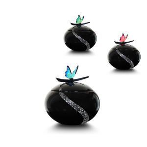 JA 139200 Urne en fibre de verre sphérique muni d'un papillon en ornement, trois couleurs disponibles